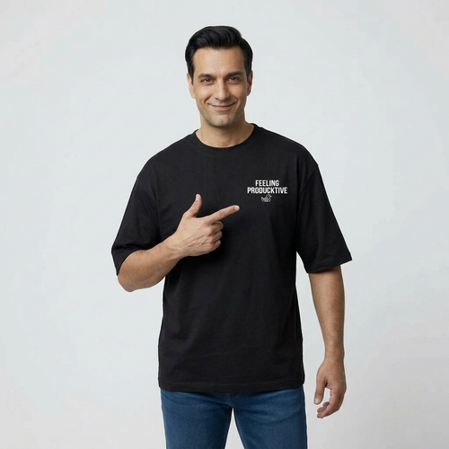 Man wearing black tee with words feeling producktive pointing towards it