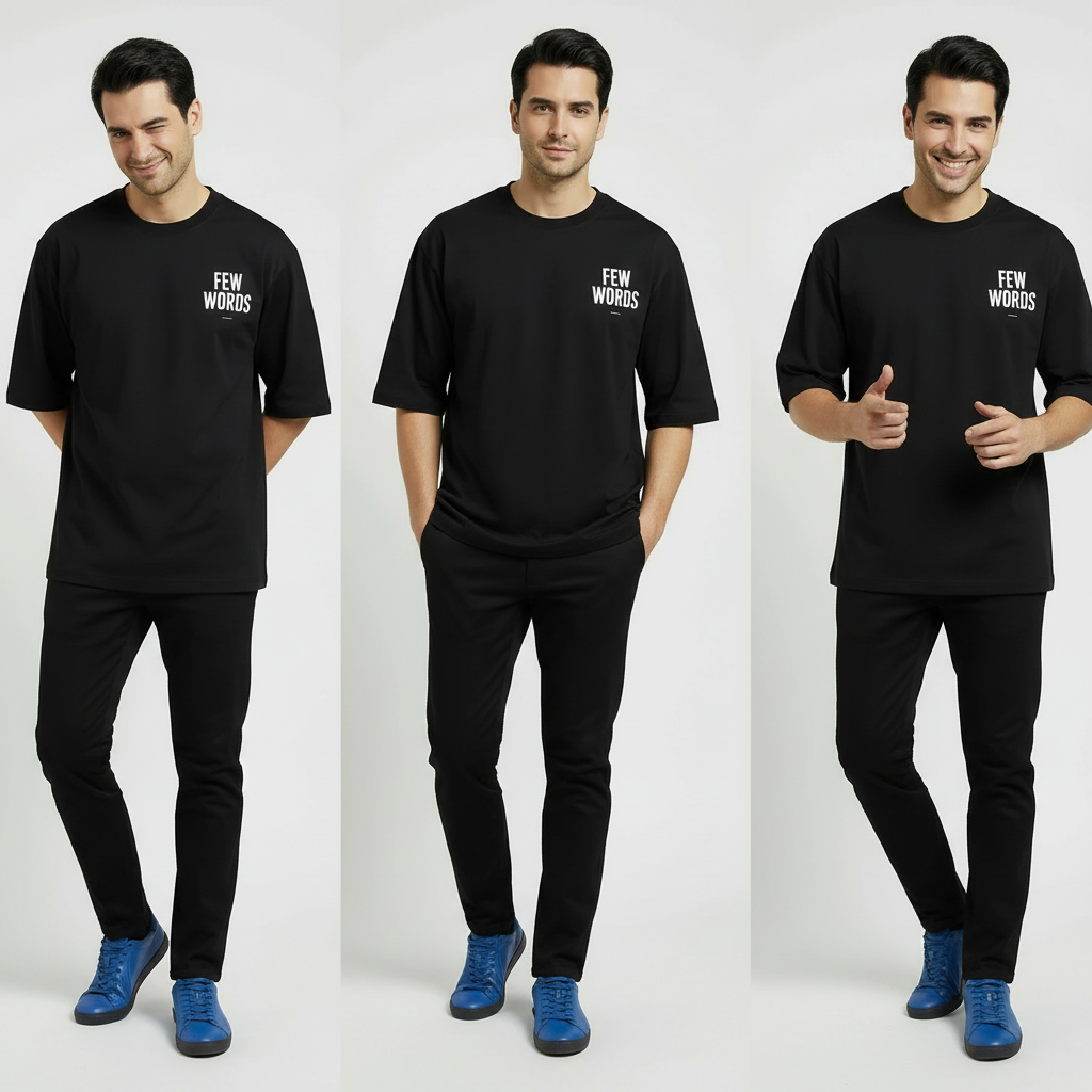 Man wearing a black  oversized t-shirt with 'FEW WORDS' text, posing against a white background.