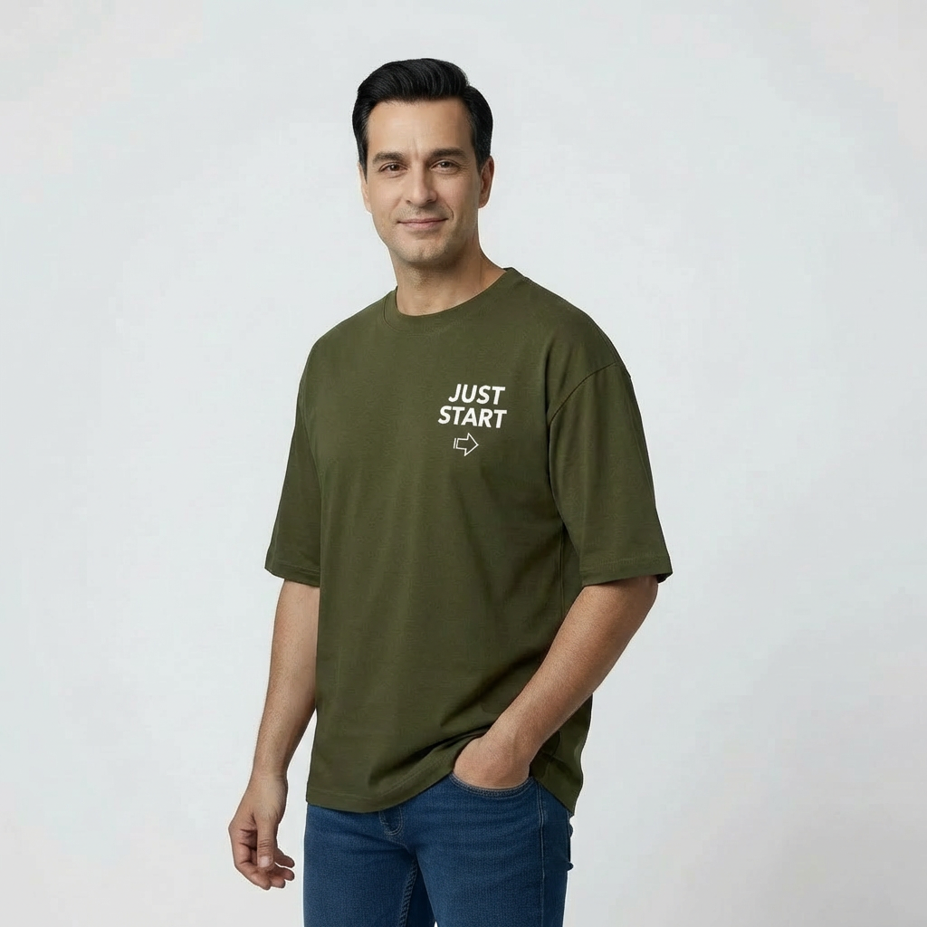 Man wearing a green t-shirt with 'JUST START' text on a white background